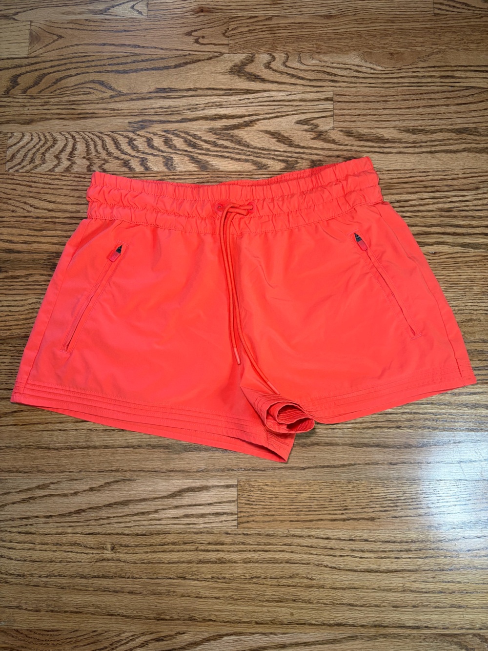 Athleta Neon Coral Athletic Shorts